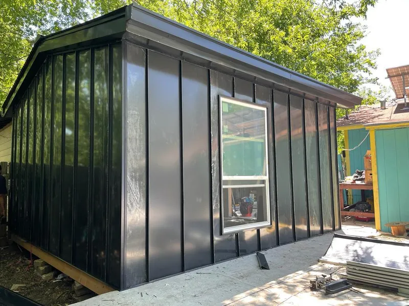 Black standing seam metal wall panels for Metal Roof Installation in Frankfort